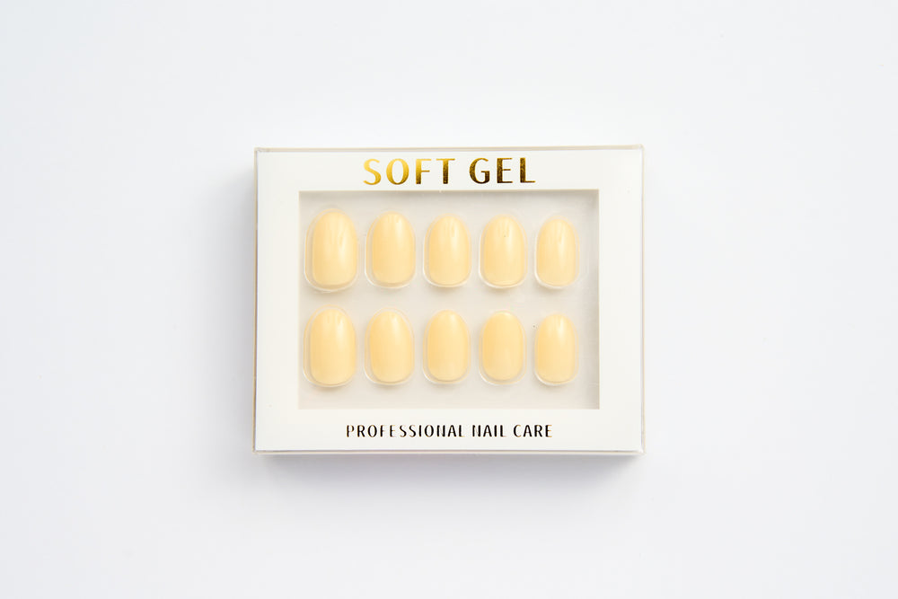 Watsons Bay Sun Butter Yellow press-on nails in the Nail Concrete Soft Gel box